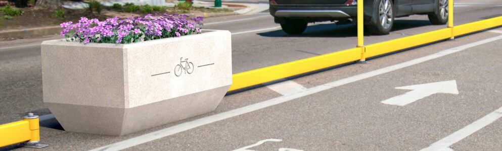 Velojosla, kas nodalīta ar apstādījumu podiem.
Mineapolisa, ASV.